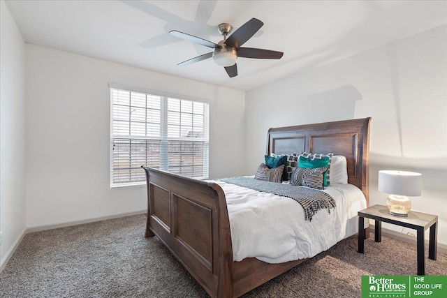 carpeted bedroom with a ceiling fan and baseboards