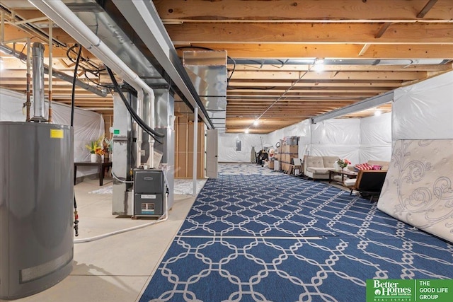 unfinished basement featuring water heater and heating unit