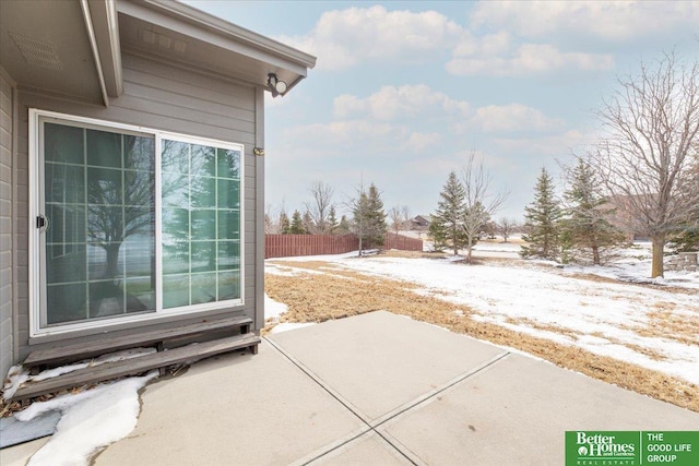 view of patio / terrace featuring fence