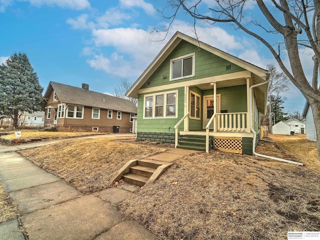 bungalow-style home with covered porch