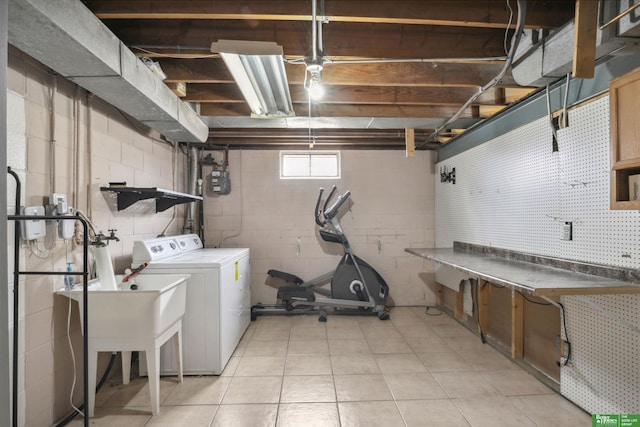 laundry room with laundry area and washing machine and clothes dryer