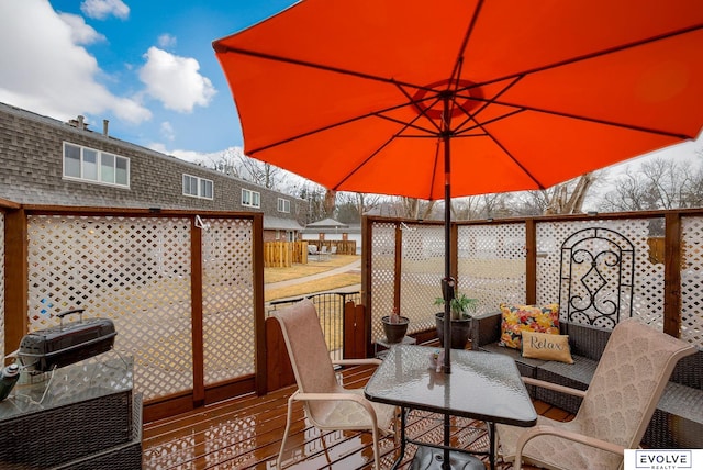 wooden terrace with area for grilling