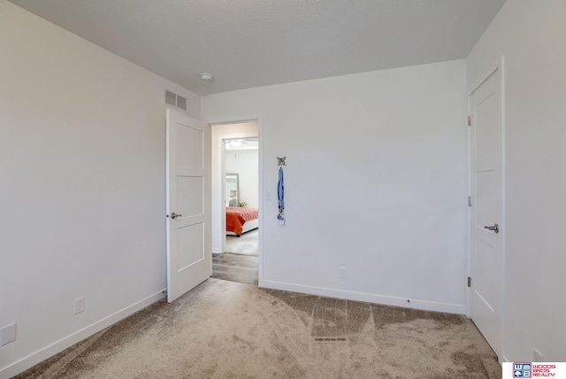 interior space with visible vents and baseboards