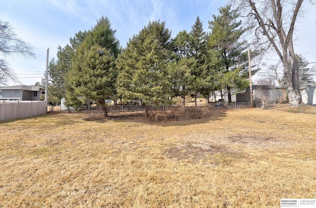 view of yard with fence