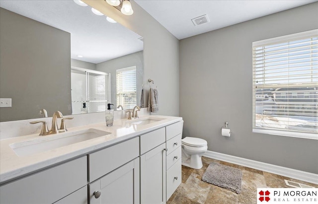 10211 Rosewater Pkwy, Bennington, NE 68007 - bathroom featuring double vanity, a stall shower, a sink, and visible vents