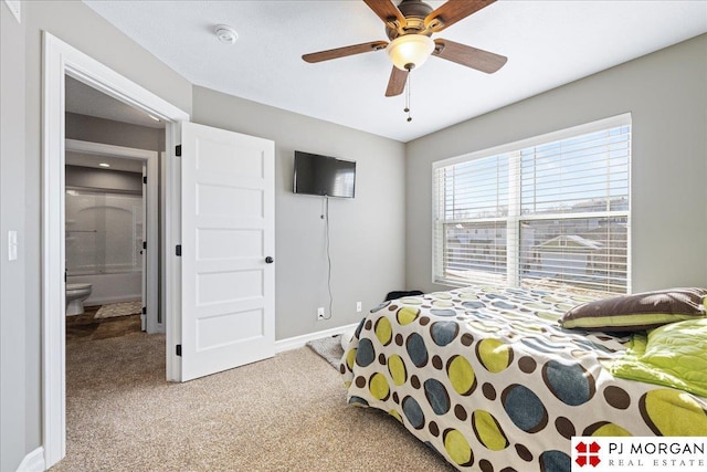 10211 Rosewater Pkwy, Bennington, NE 68007 - bedroom with baseboards, a ceiling fan, and light colored carpet