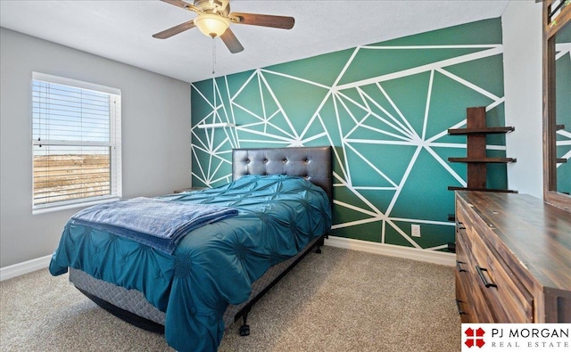 10211 Rosewater Pkwy, Bennington, NE 68007 - carpeted bedroom featuring an accent wall and baseboards