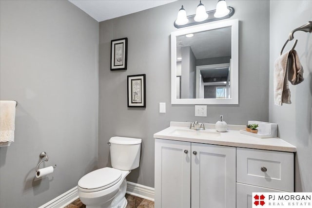 10211 Rosewater Pkwy, Bennington, NE 68007 - half bathroom with toilet, baseboards, and vanity