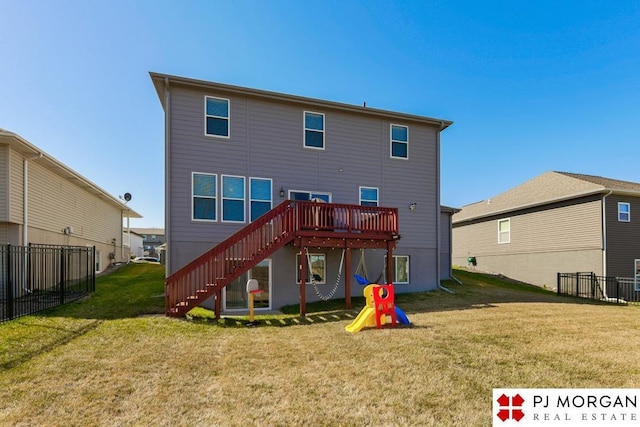 10211 Rosewater Pkwy, Bennington, NE 68007 - back of house featuring stairway, fence, a deck, and a lawn