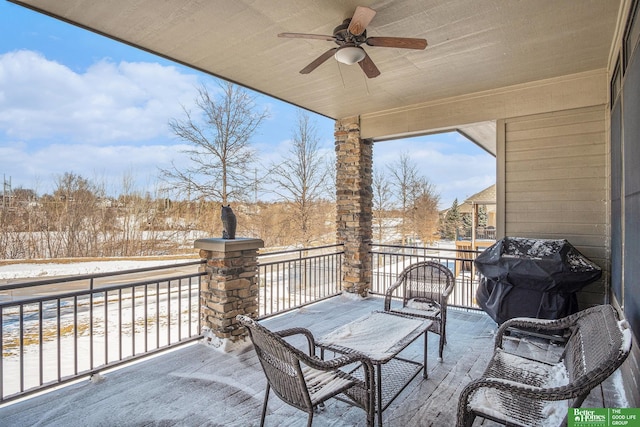 view of patio featuring a balcony, a ceiling fan, and grilling area