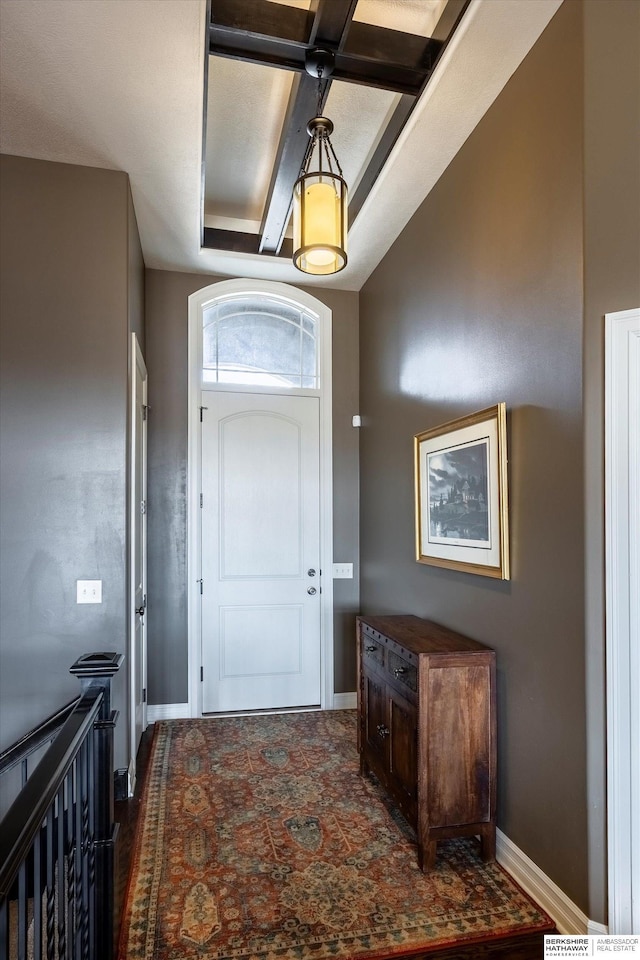 entrance foyer featuring baseboards