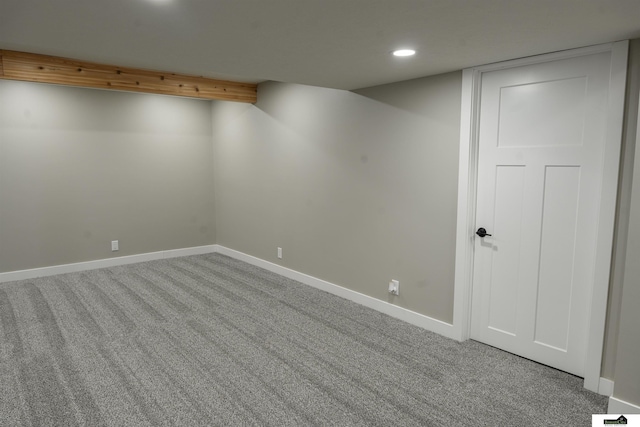 finished below grade area featuring carpet floors, baseboards, and recessed lighting