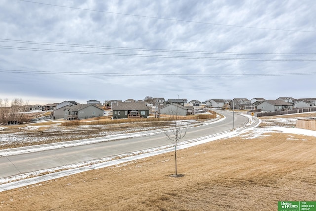 view of street featuring a residential view and sidewalks