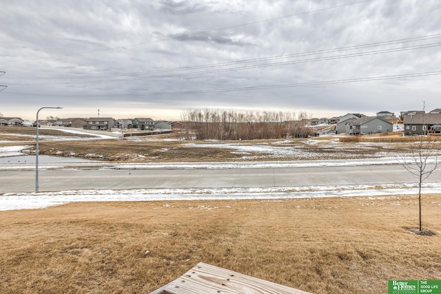 view of yard featuring a residential view