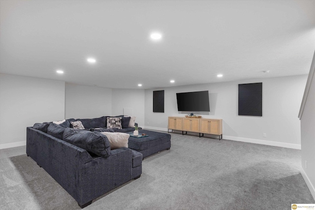 living room featuring baseboards, carpet, and recessed lighting