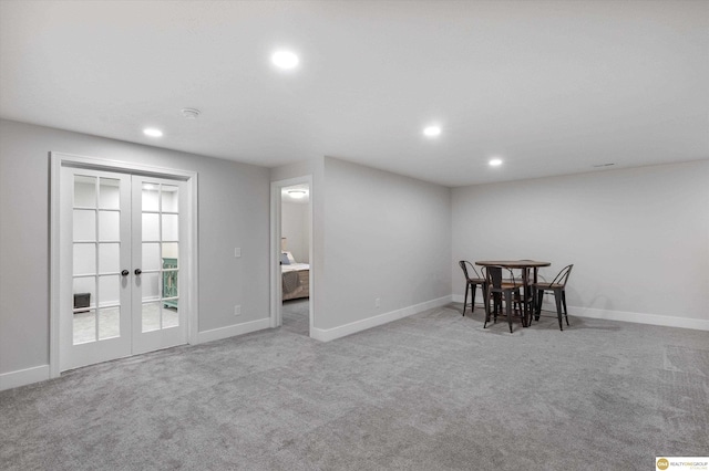 carpeted dining space featuring baseboards, french doors, and recessed lighting