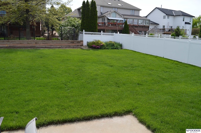 view of yard with fence