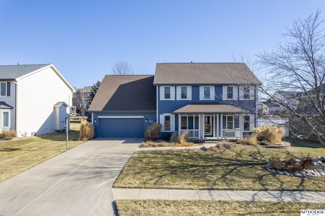 colonial home with an attached garage, covered porch, a front lawn, and concrete driveway