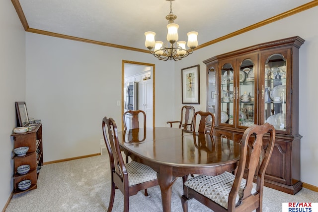 dining area with light carpet, an inviting chandelier, baseboards, and crown molding