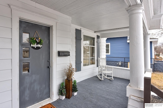 entrance to property with covered porch