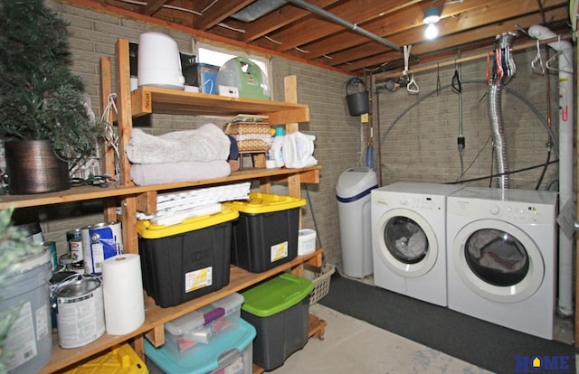 washroom with independent washer and dryer