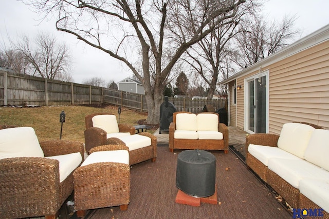 view of patio / terrace featuring an outdoor hangout area and a fenced backyard