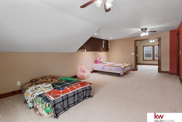 bedroom featuring a ceiling fan, light colored carpet, and baseboards