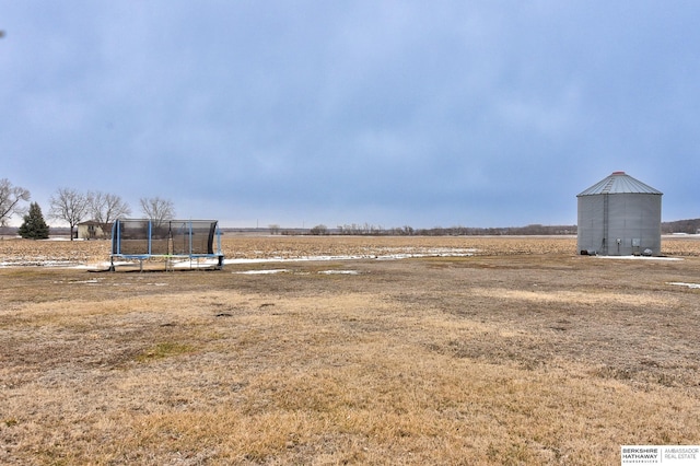 view of yard featuring a trampoline