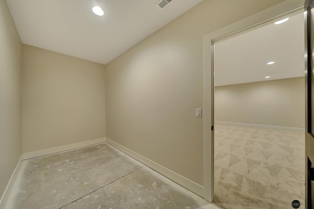 interior space with recessed lighting, visible vents, and baseboards