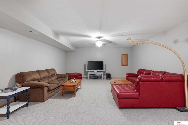 carpeted living area featuring visible vents