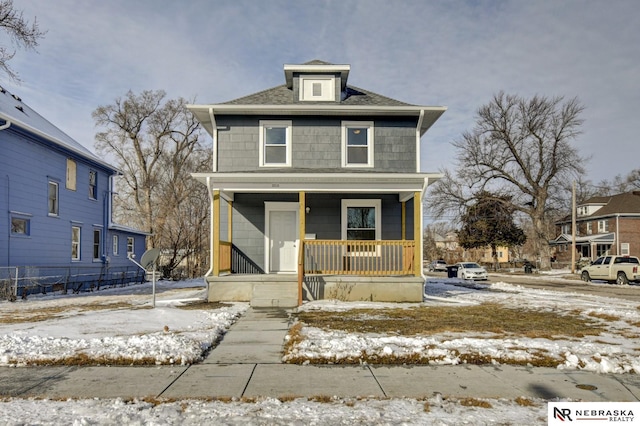 traditional style home featuring a porch