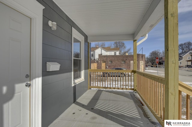 balcony featuring covered porch