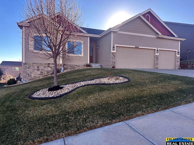 ranch-style home featuring a front yard, stone siding, driveway, and an attached garage