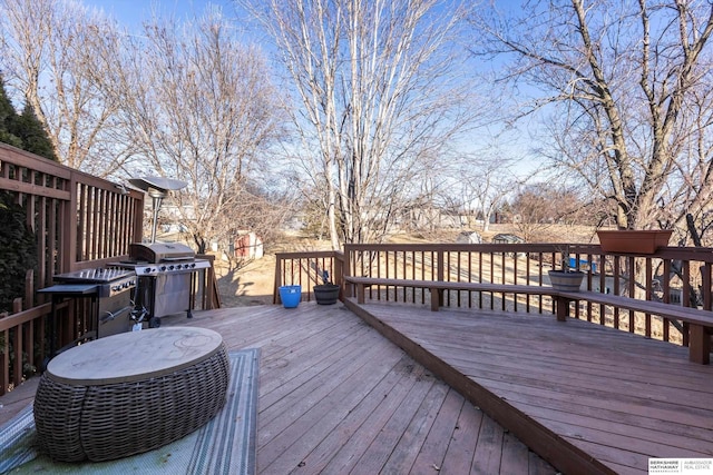 wooden terrace with grilling area