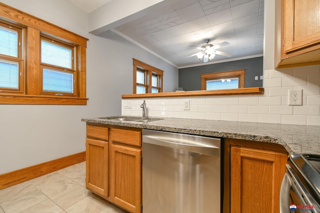 kitchen with a sink, backsplash, stainless steel appliances, and crown molding