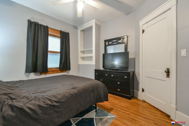 bedroom featuring ceiling fan and wood finished floors