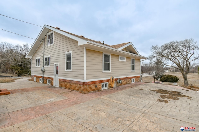 view of home's exterior with driveway