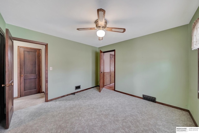 unfurnished bedroom with visible vents, ceiling fan, baseboards, and carpet floors