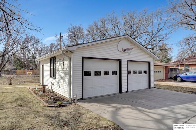 detached garage with fence