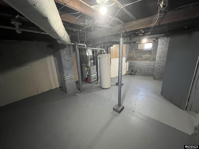 basement with water heater and heating unit