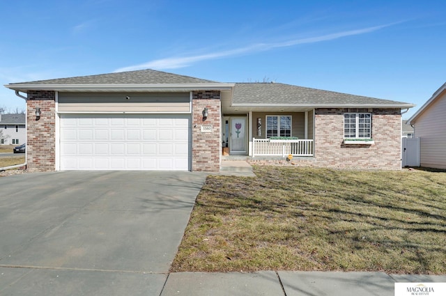 single story home featuring driveway, a porch, roof with shingles, a front yard, and an attached garage