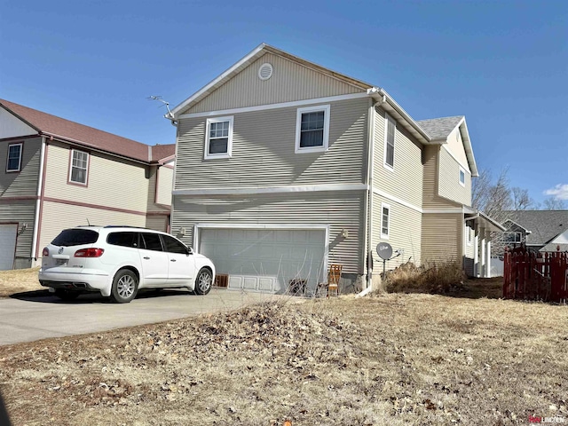 exterior space featuring driveway and a garage