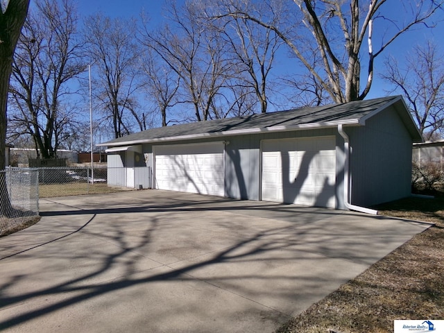 detached garage with fence