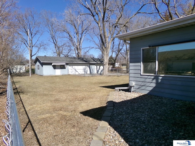 view of yard featuring fence