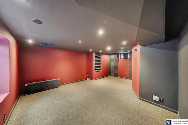 interior space with recessed lighting, baseboards, and carpet flooring