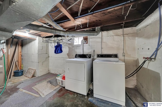 clothes washing area with laundry area and separate washer and dryer