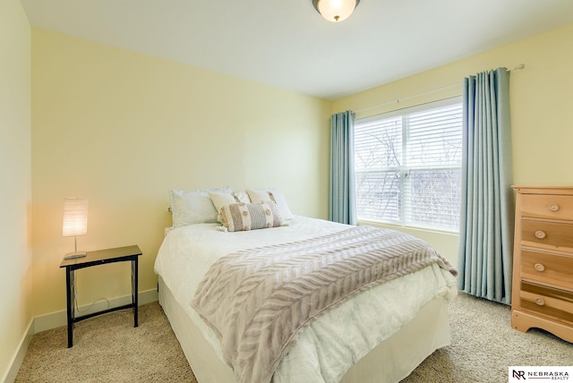 bedroom featuring baseboards