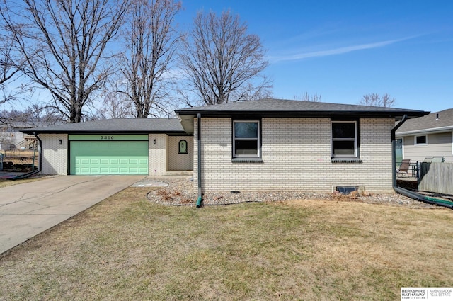 view of front of property featuring a front yard, an attached garage, brick siding, and driveway