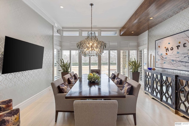 dining area featuring recessed lighting, wallpapered walls, baseboards, a chandelier, and an accent wall