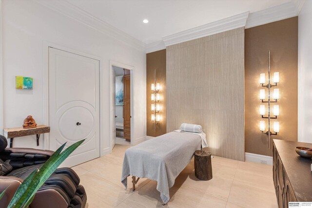 bedroom featuring ornamental molding, ensuite bath, recessed lighting, light tile patterned floors, and baseboards